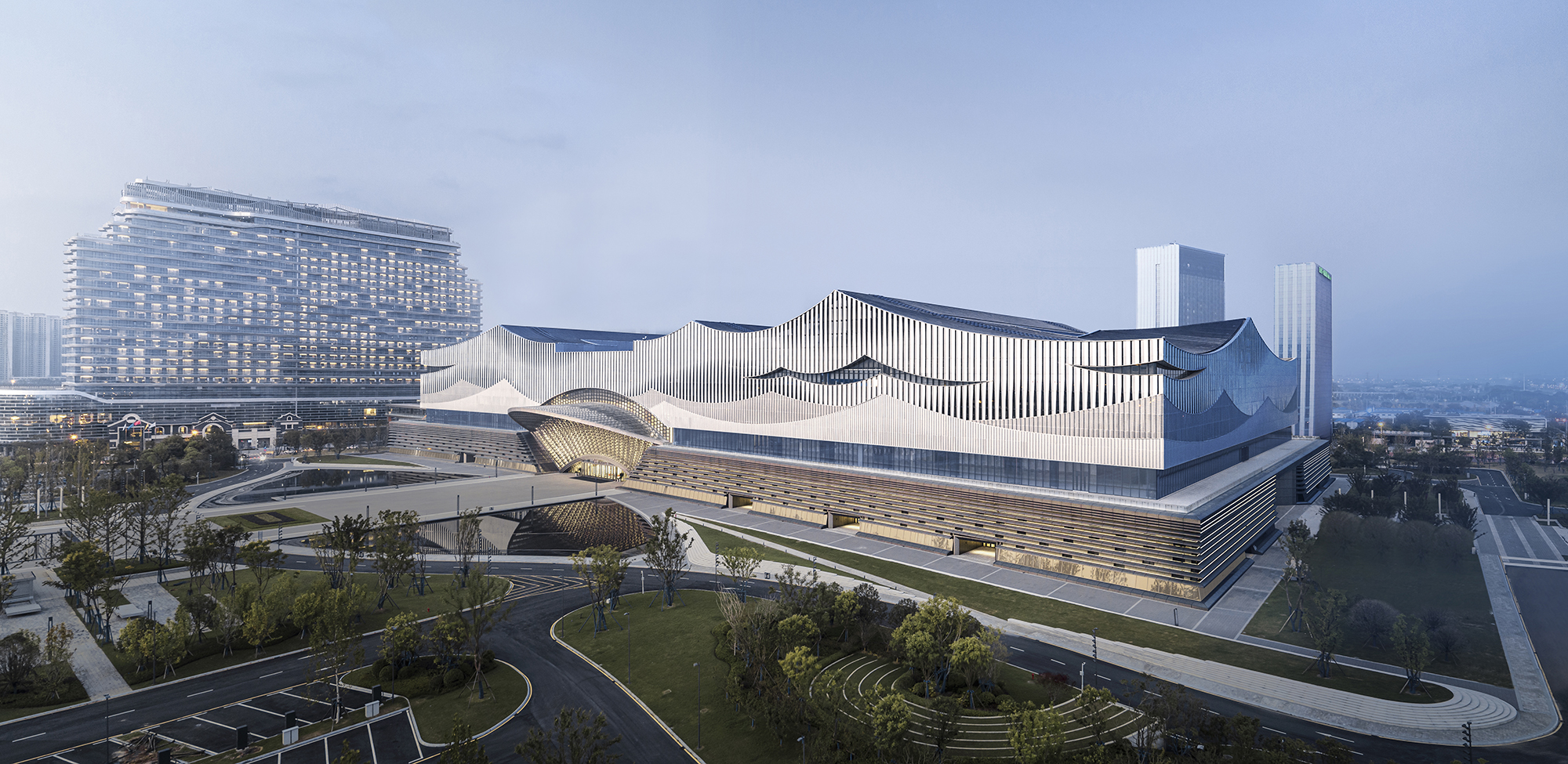 water landscapes, architectural design, urban water features, Chinese architecture, landscape integration, waterfront projects, sustainable design, natural elements in architecture, contemporary architecture, cultural spaces