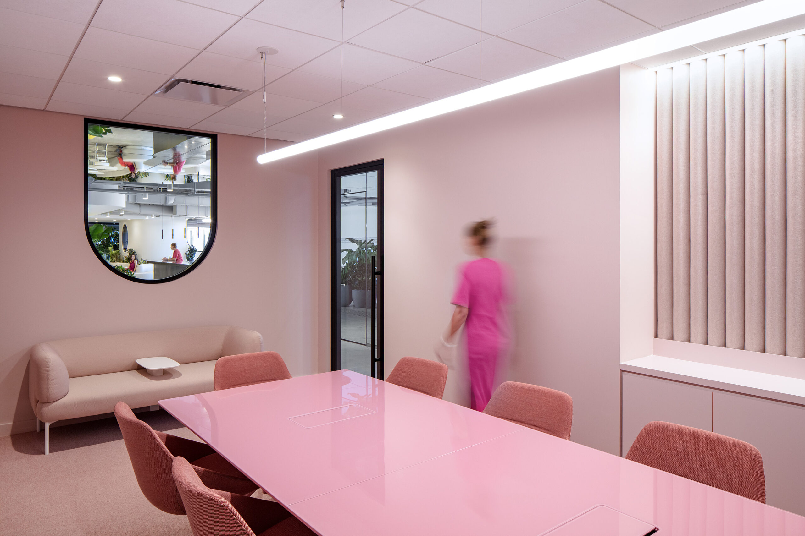 Techless pink meeting room.