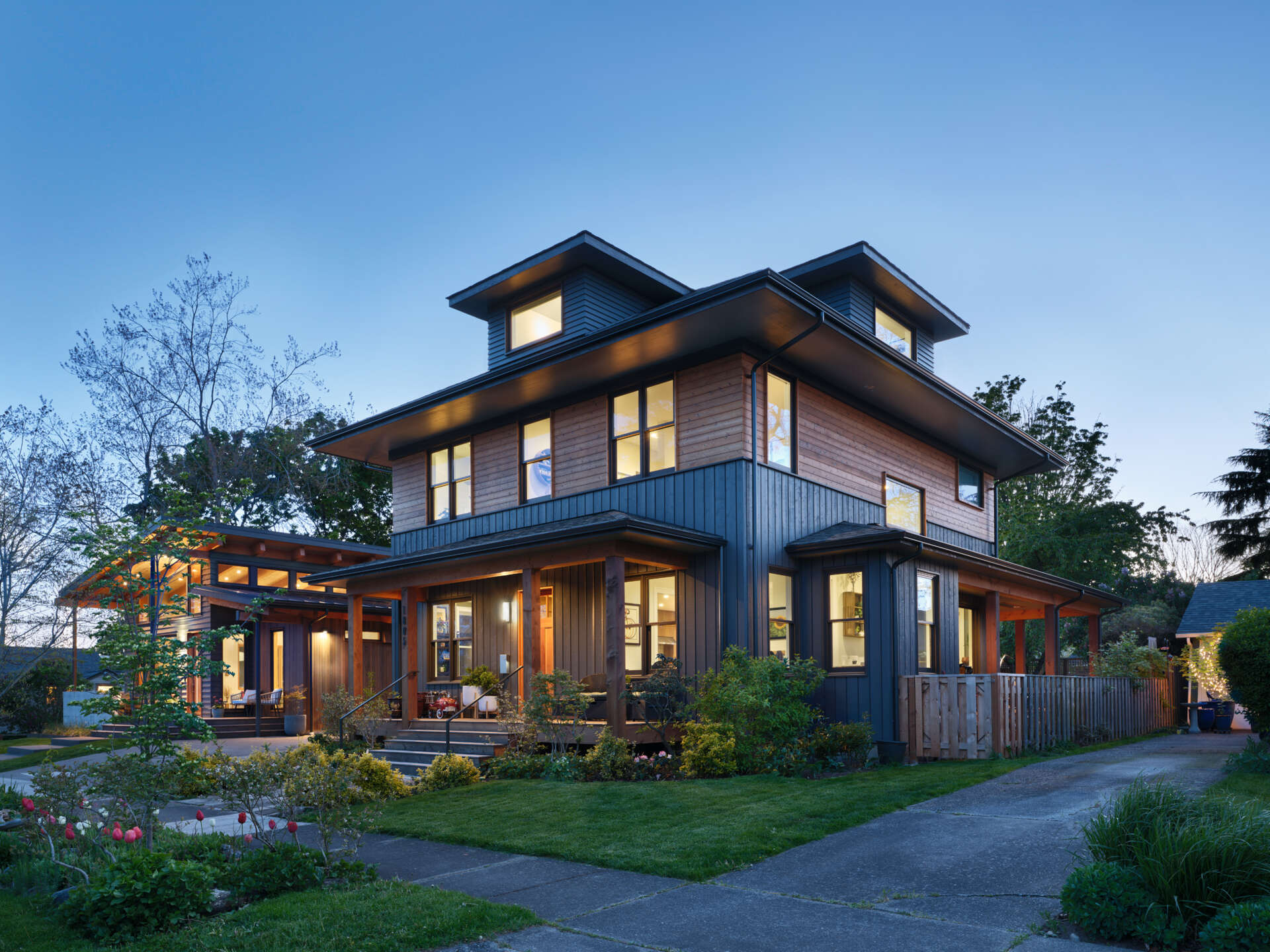 A young family built two modern homes, personally acting as general contractors, blending contemporary design with tradition.