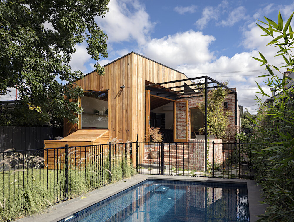 A contemporary extension that sits behind the original Victorian weatherboard home and gently reshapes how the family lives from morning to night.