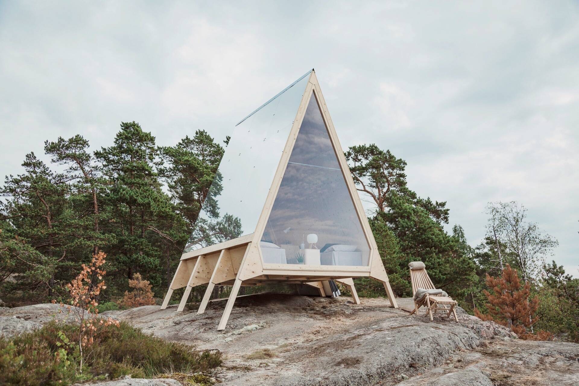 A tiny Finnish cabin near Helsinki shows how zero emission living can work, combining renewable energy, minimal interiors, and a design that leaves no trace on the landscape.