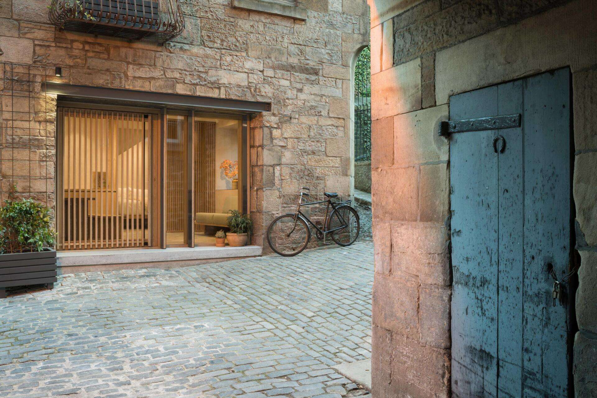An 18th century blacksmith’s workshop in Edinburgh’s Old Town reimagined as a contemporary studio using natural materials and local craftsmanship.