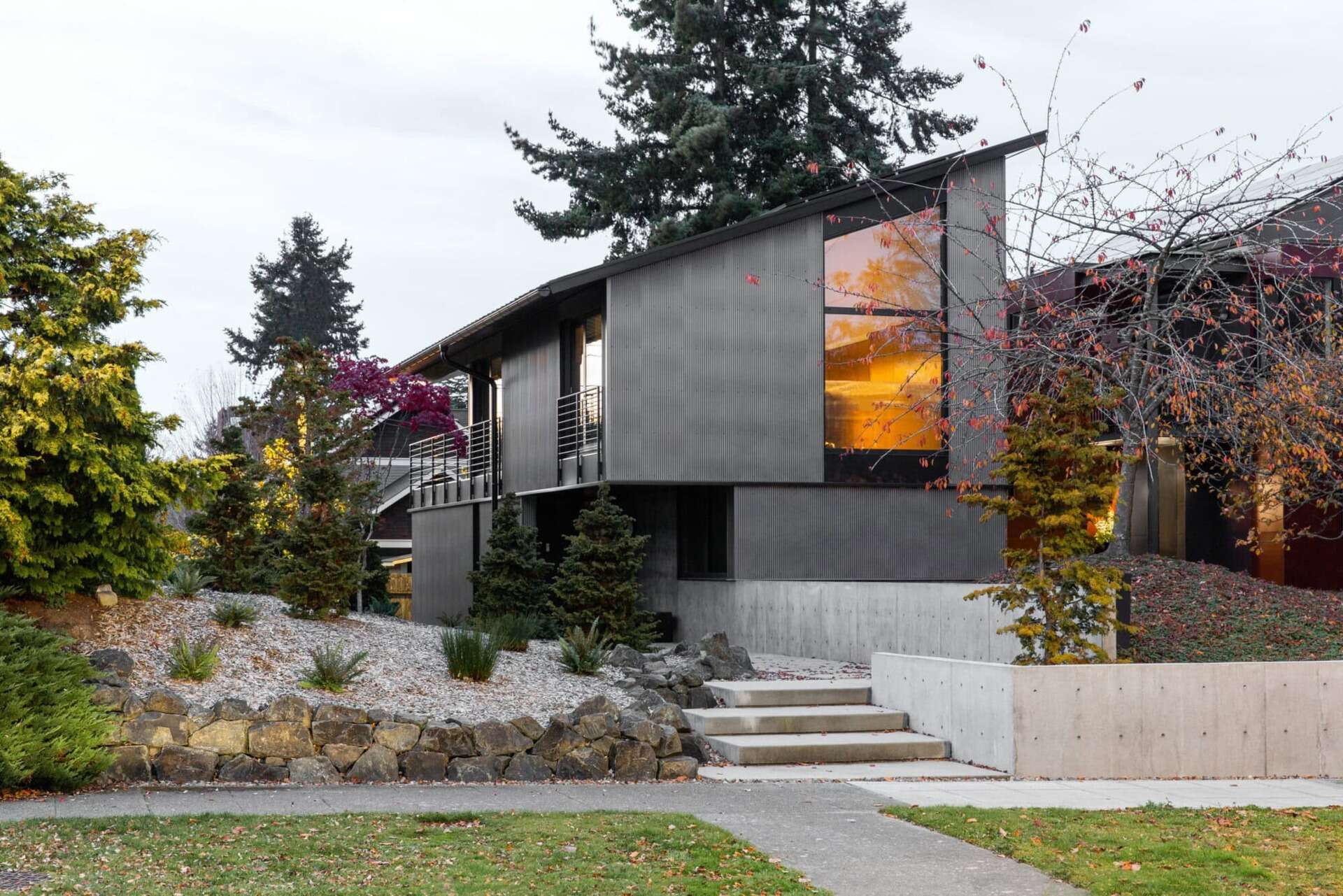 This Seattle home uses corrugated metal siding as its only exterior material, creating a bold yet minimalist look inspired by Japanese Shibui.